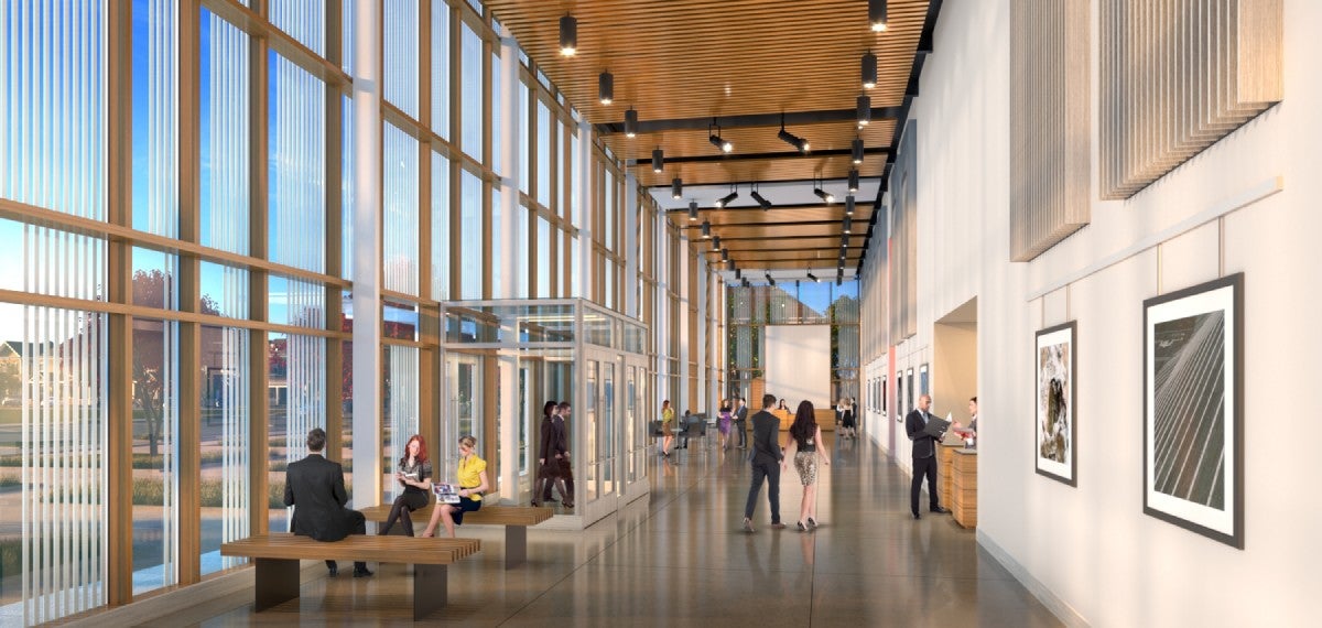 rendering of people sitting and walking through the center gallery