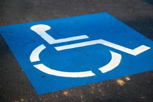 Handicapped Parking Sign Photo by AbsolutVision on Unsplash